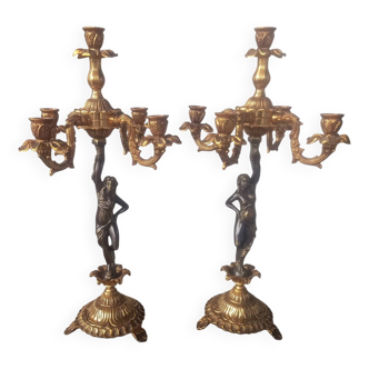 Pair of gilded bronze candlesticks with nude women