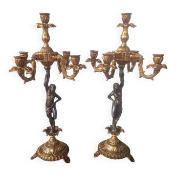Pair of gilded bronze candlesticks with nude women