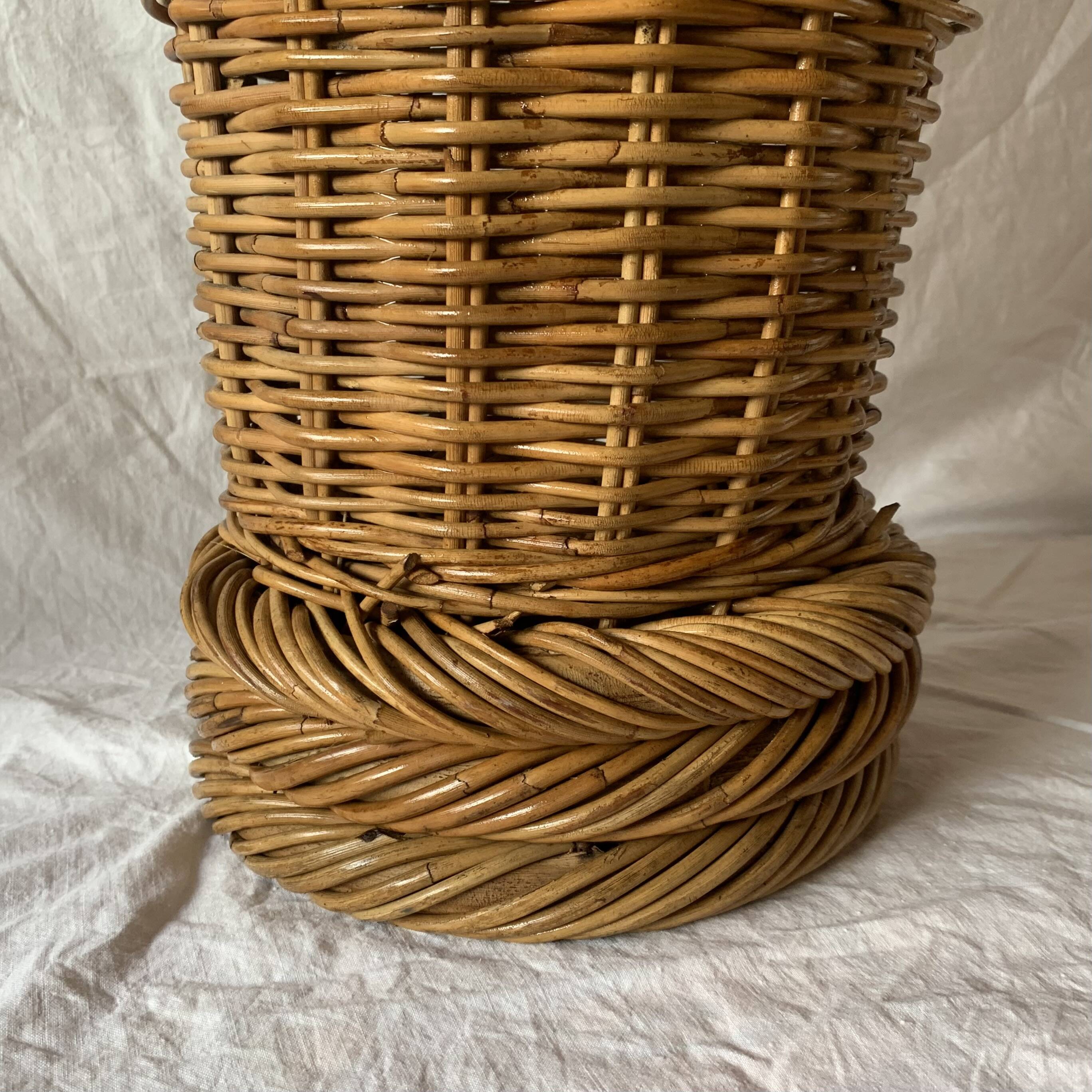 Vintage woven wicker umbrella stand