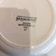 Lot de 7 assiettes et un plat Diguoin