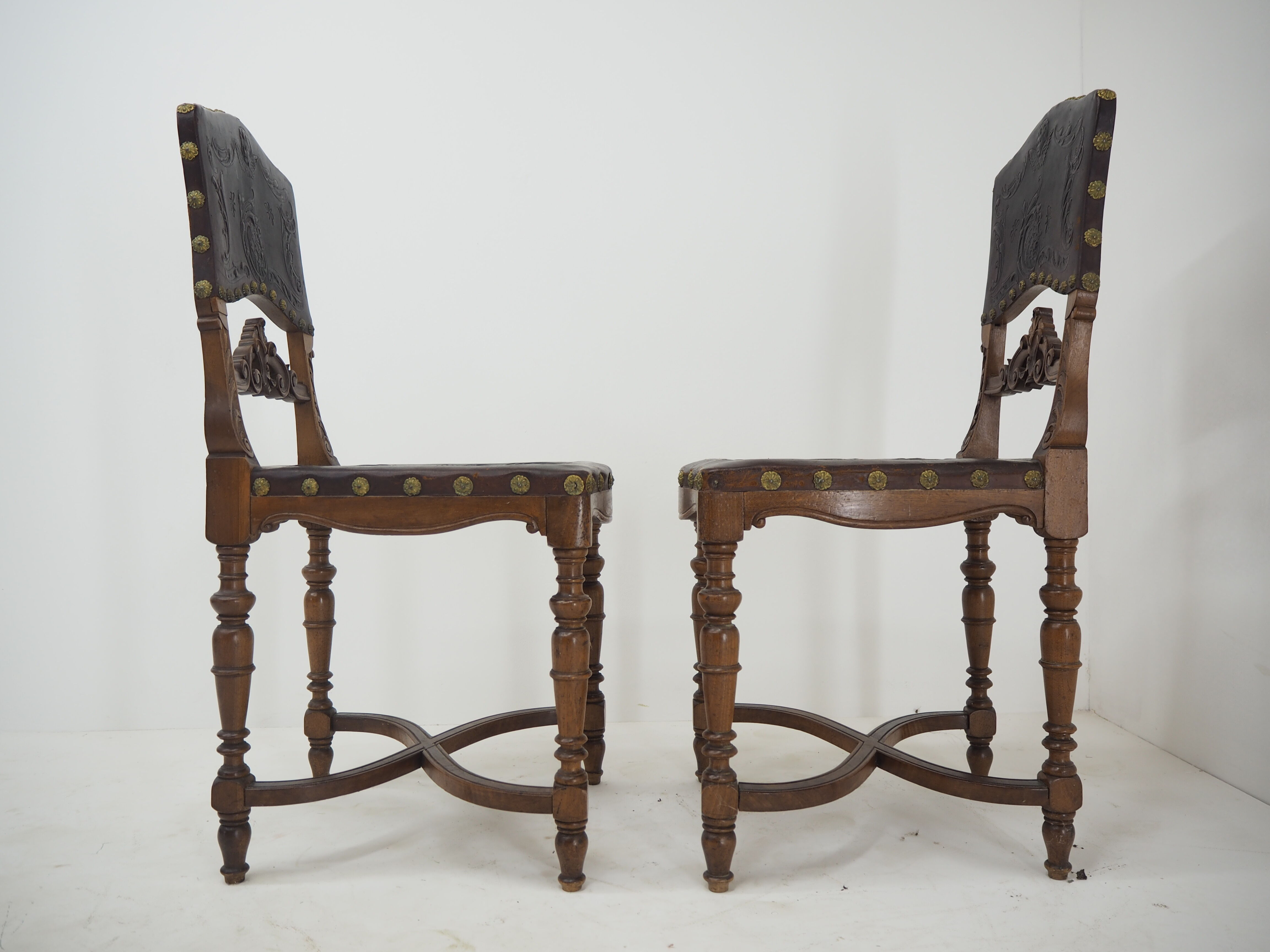 Pair of Antique Embossed Leather Chairs