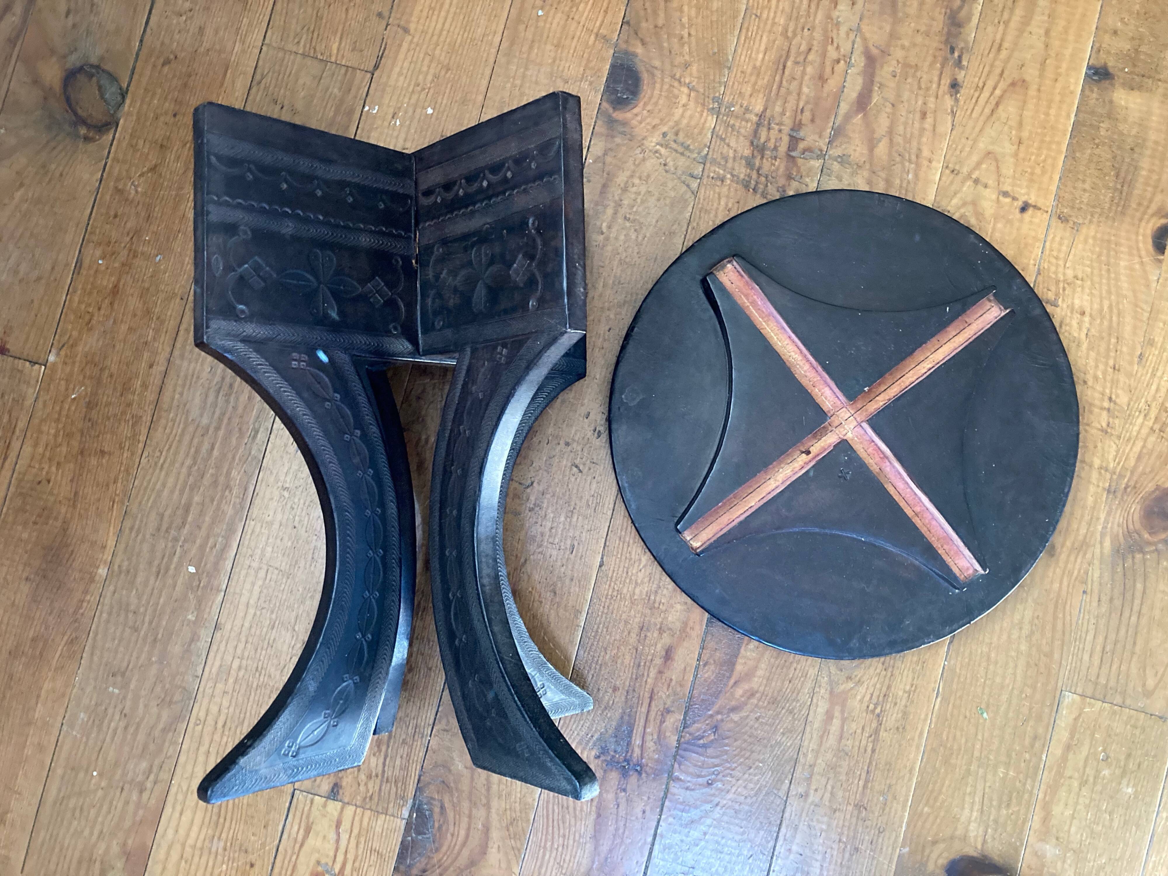 Touareg pedestal tables in wood and embossed leather