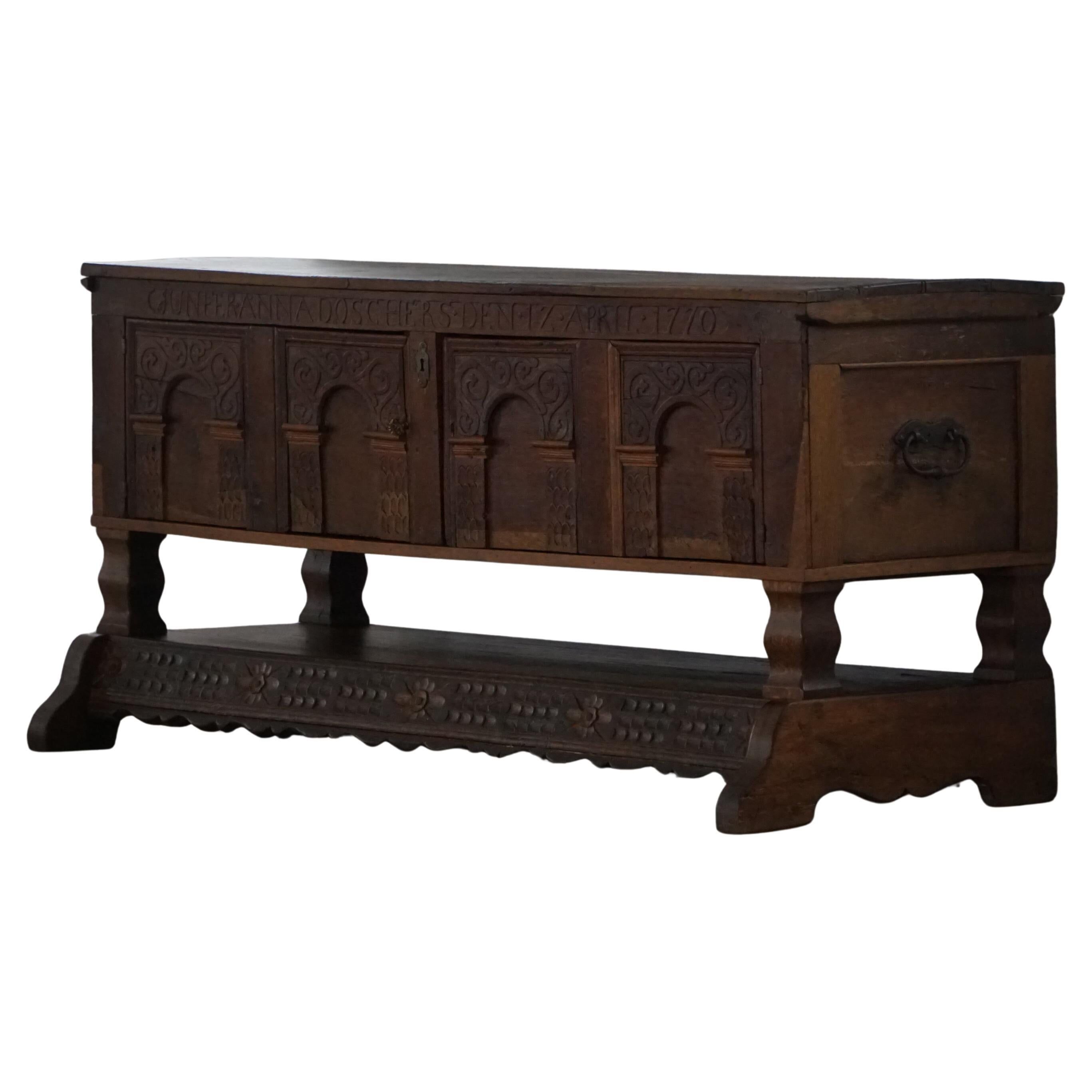 Danish baroque oak buffet from the early 18th century, carved details, 1700-1750.