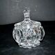 Thick moulded crystal sugar bowl with a beaded and medallion design.