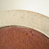 Artisanal round mirror in vintage green sandstone signed