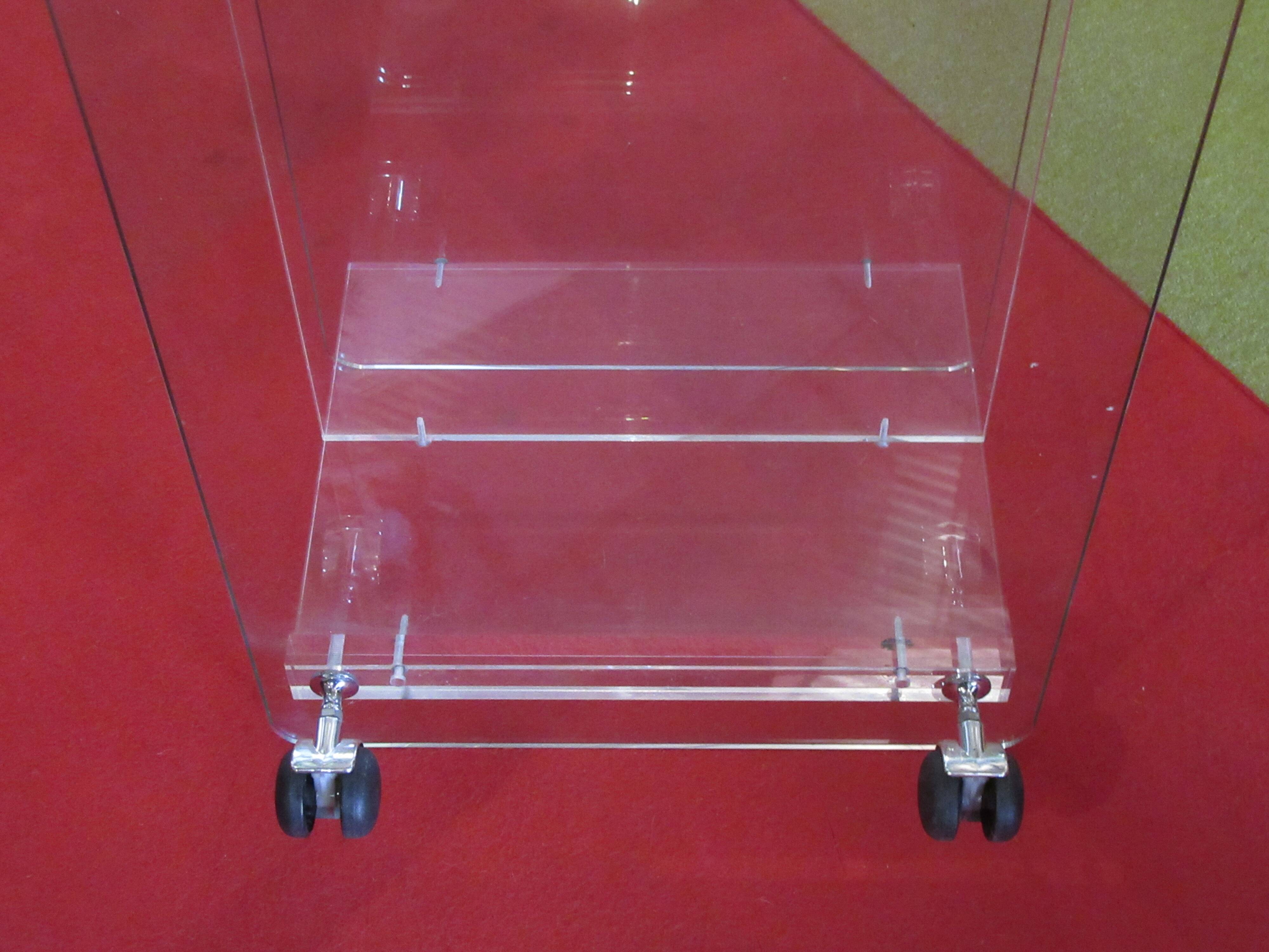 vintage glass coffee table with plexiglass legs