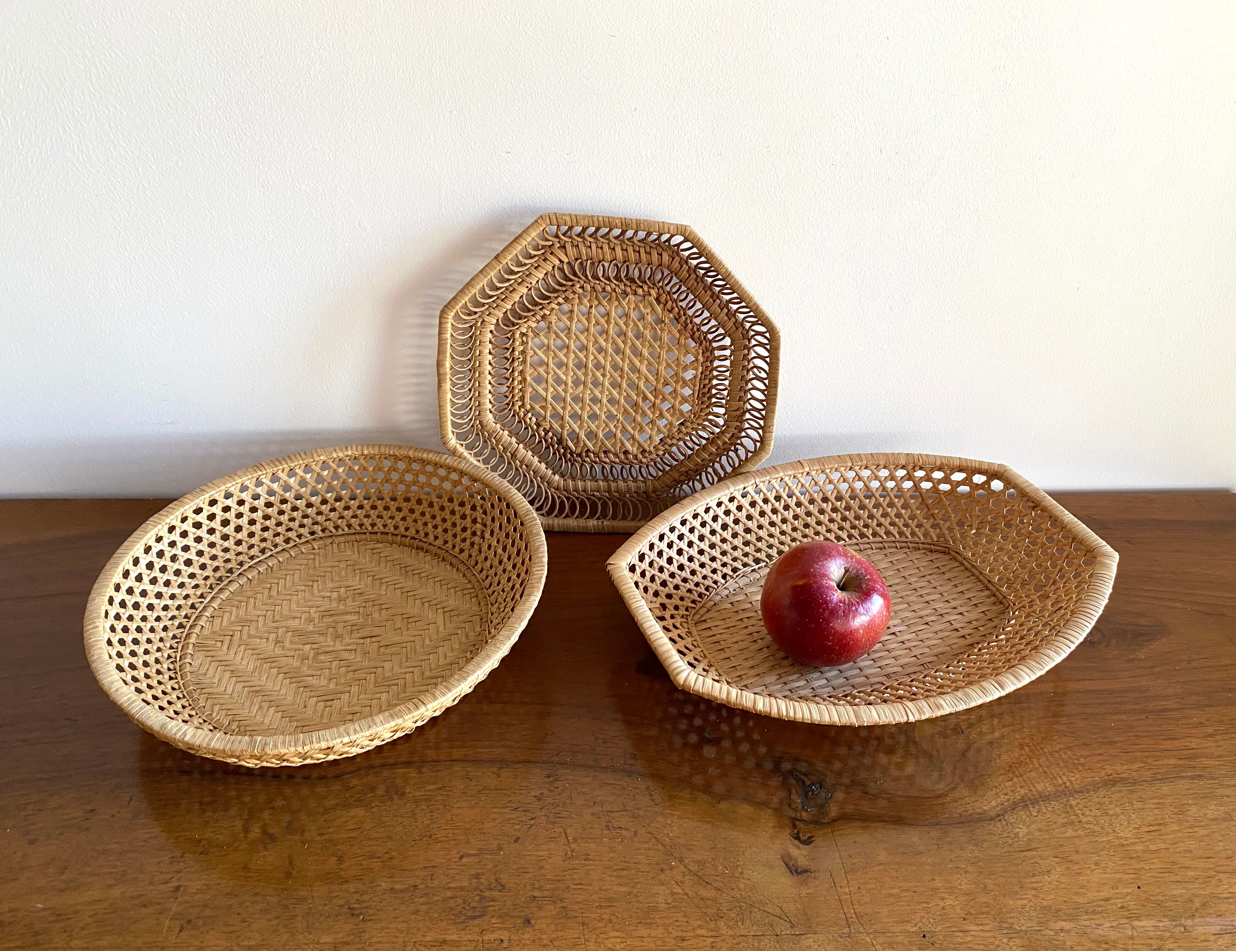 Pair of vintage braided rattan baskets