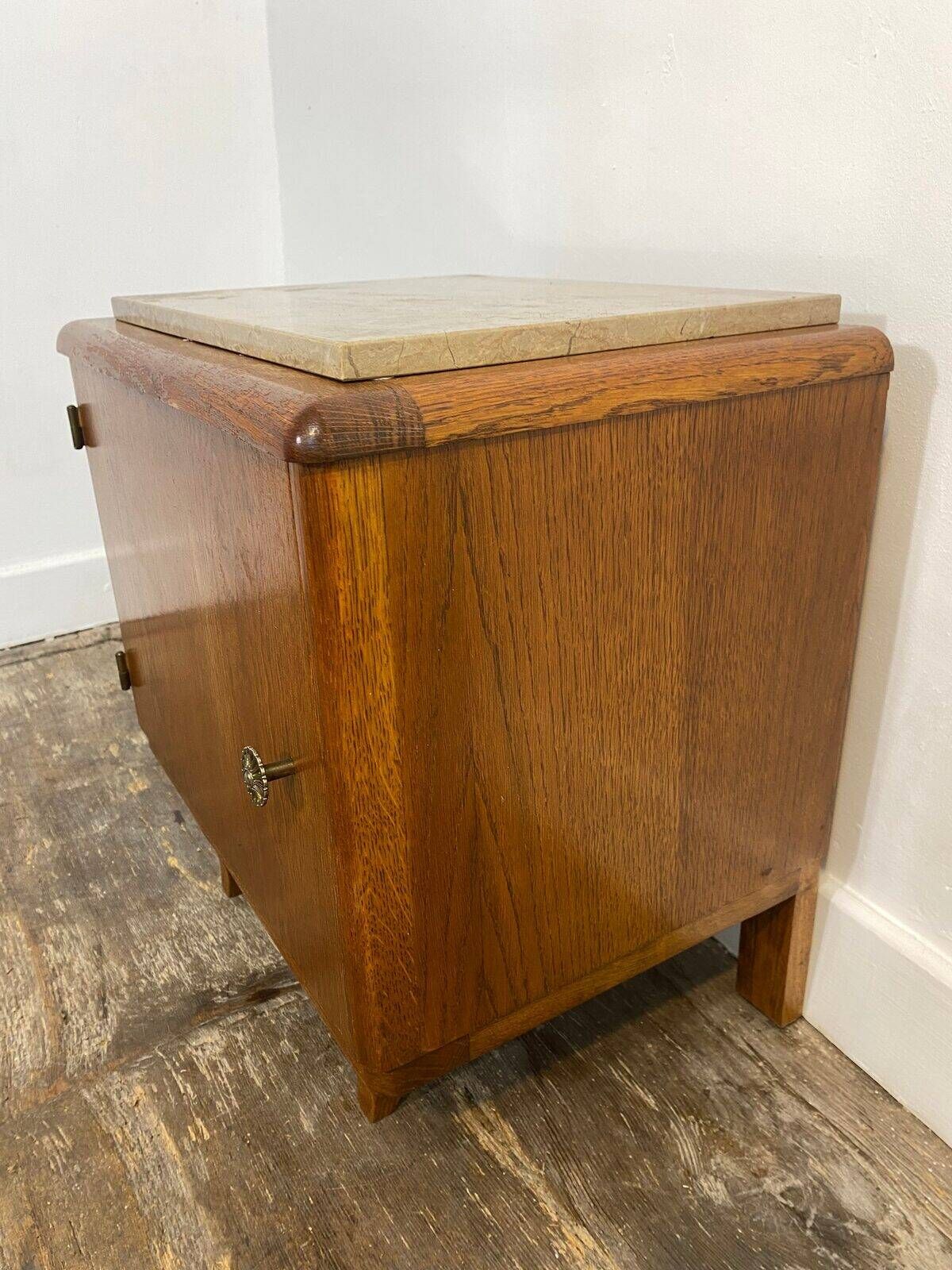 Small wooden piece of furniture with a marble top, 1950s.
