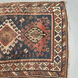 Antique kazak rug blue ground