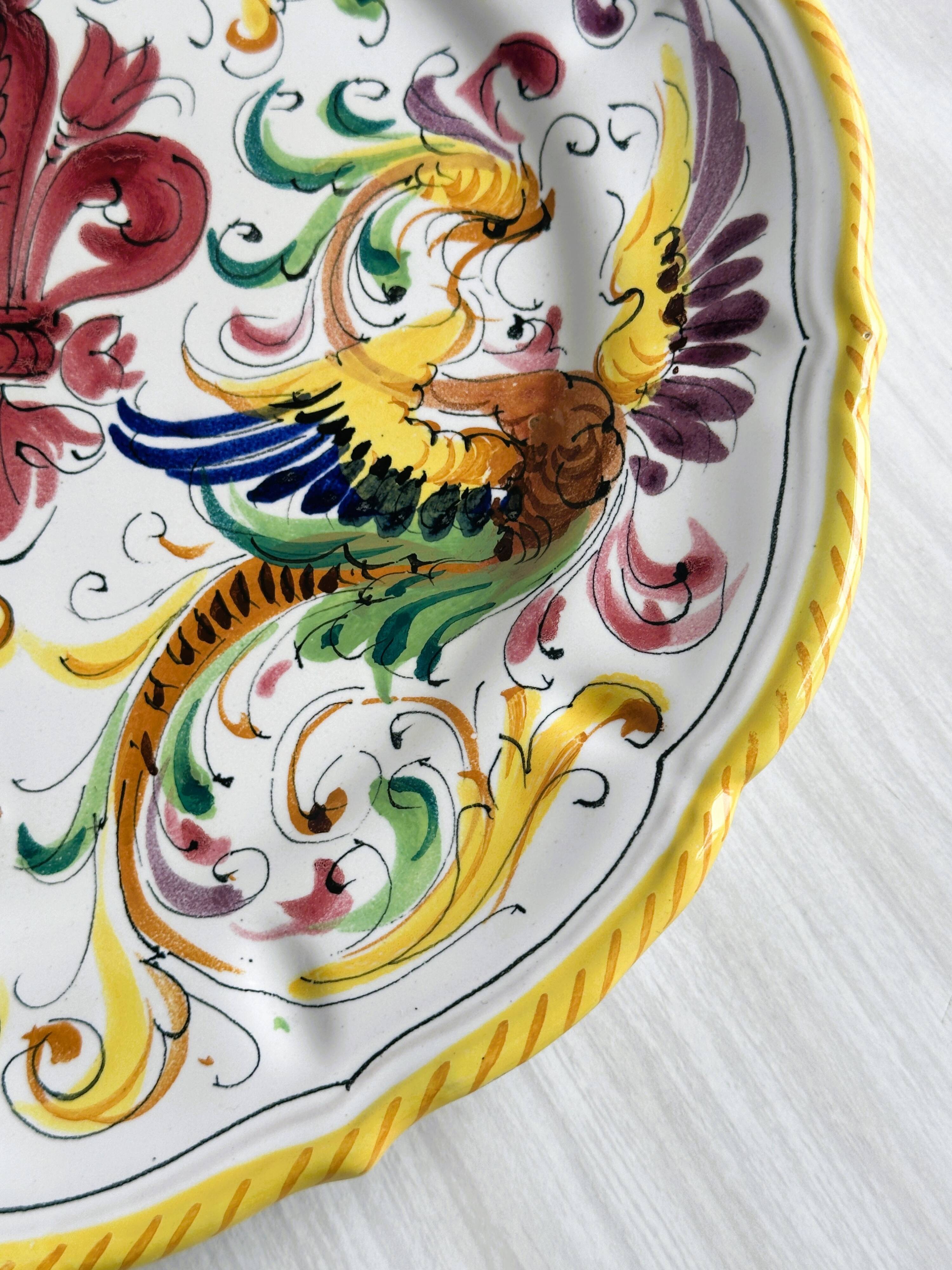 Decorative wall plate in hand-painted earthenware