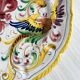 Decorative wall plate in hand-painted earthenware