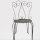 Pair of wrought iron garden chairs