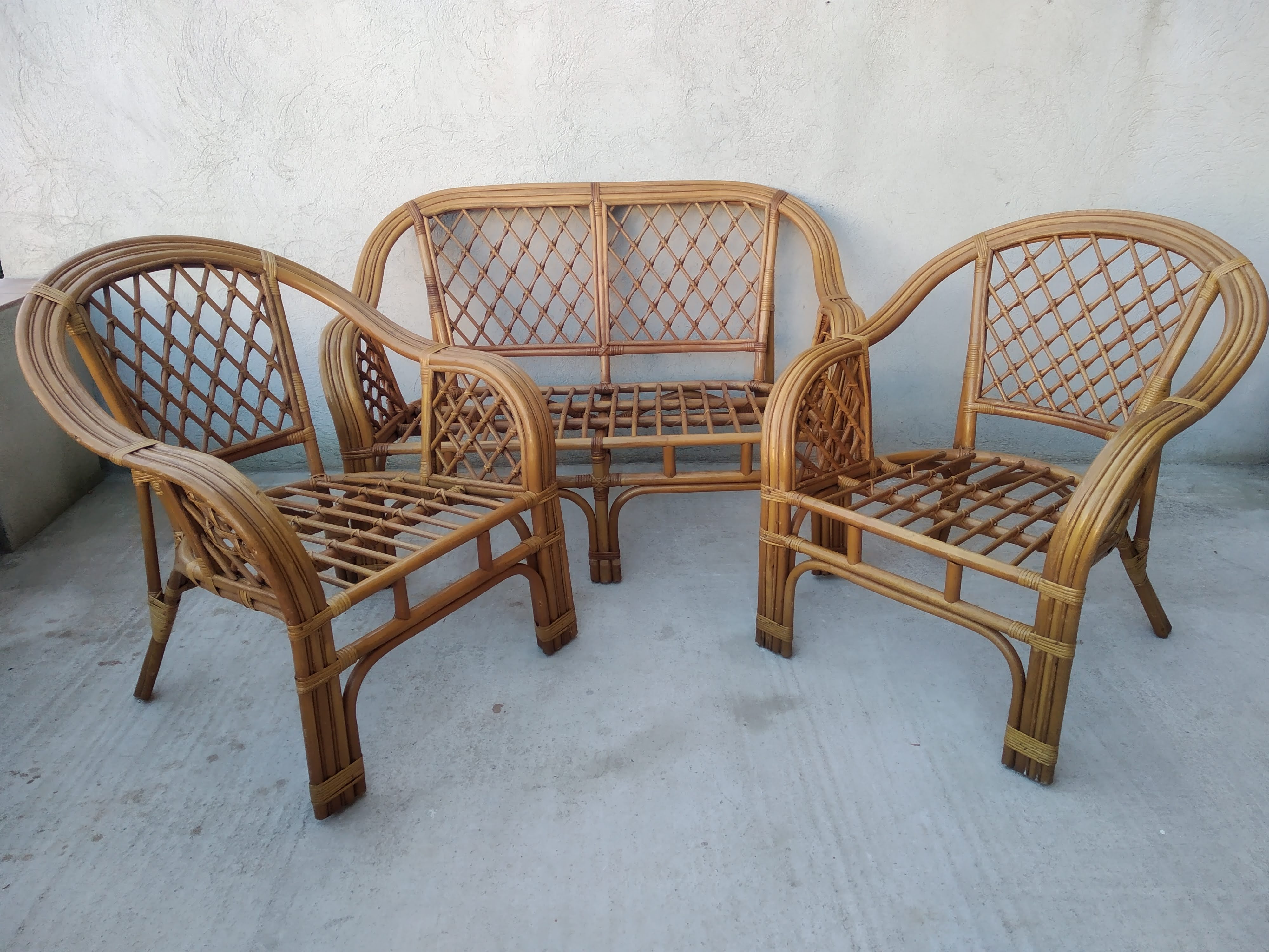 Pair of vintage rattan armchairs