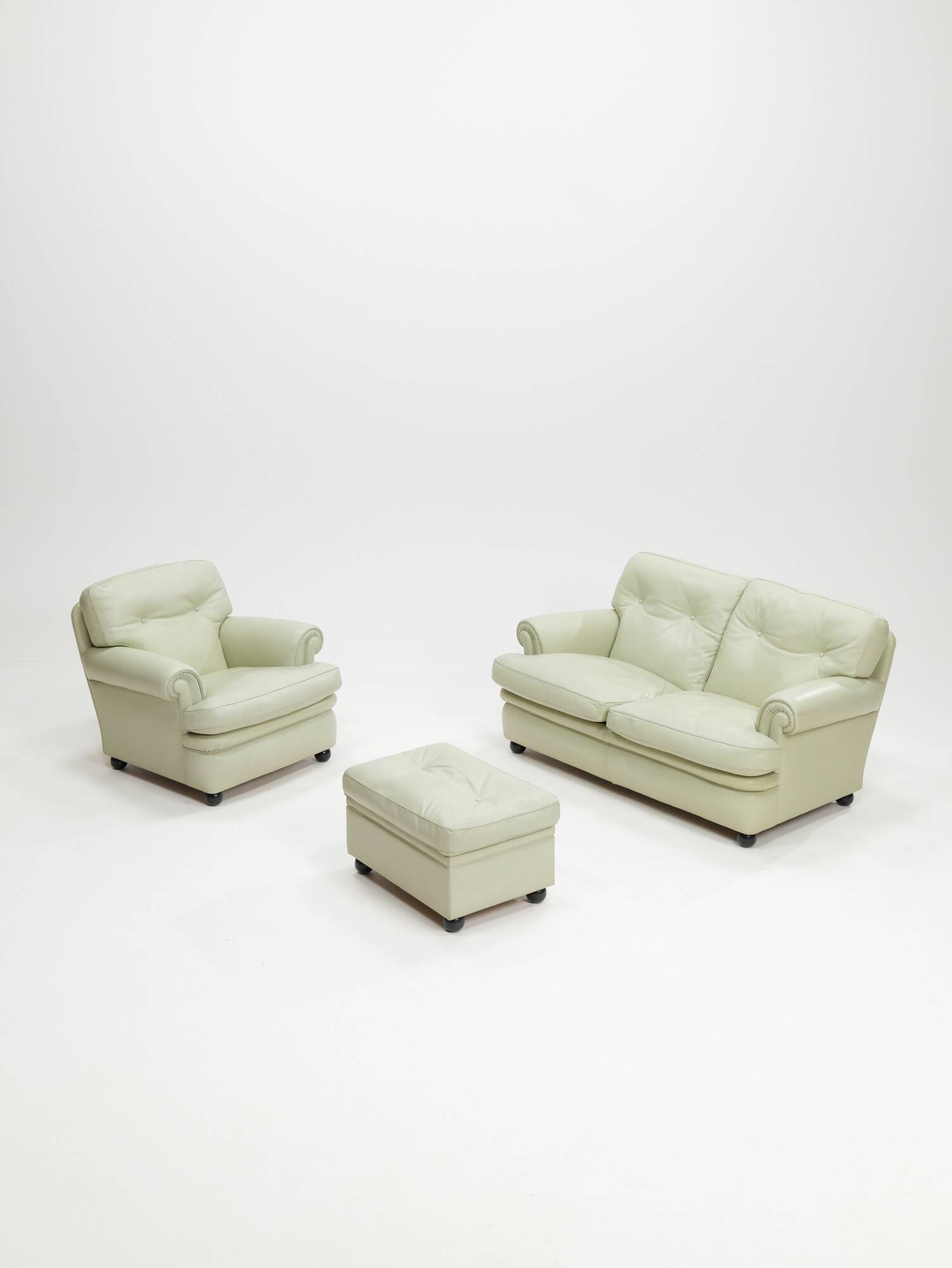 Poltrona Frau 'Dream B' armchair and ottoman, Italy, 1980s