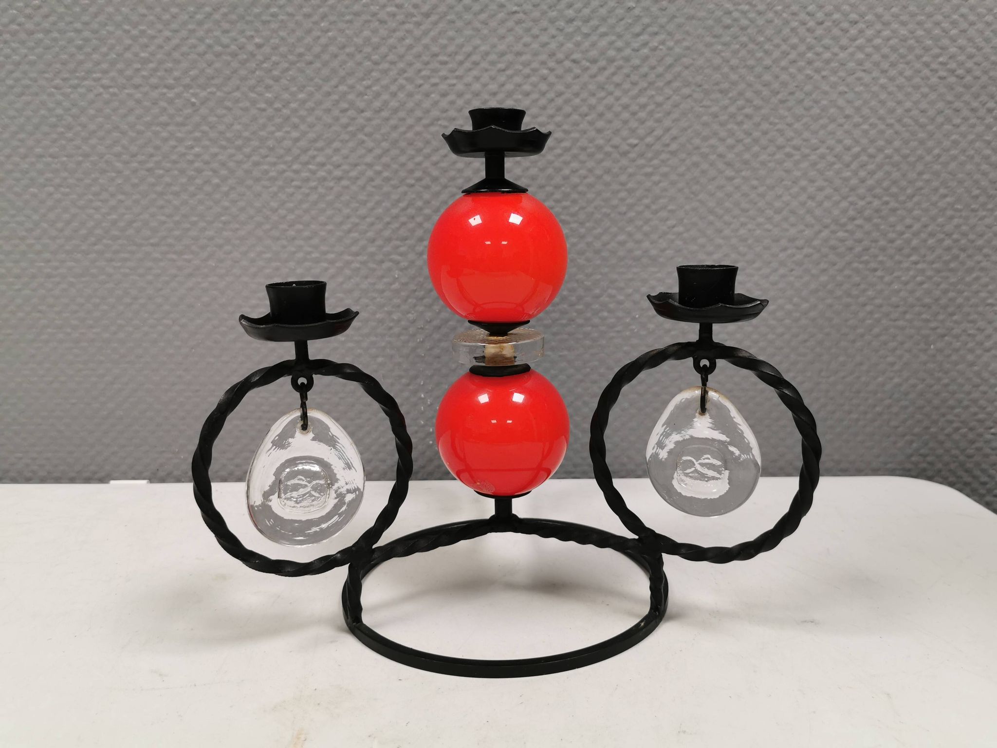 Wrought iron candle holder for 4 candles. by Erik Höglund in the 1960s