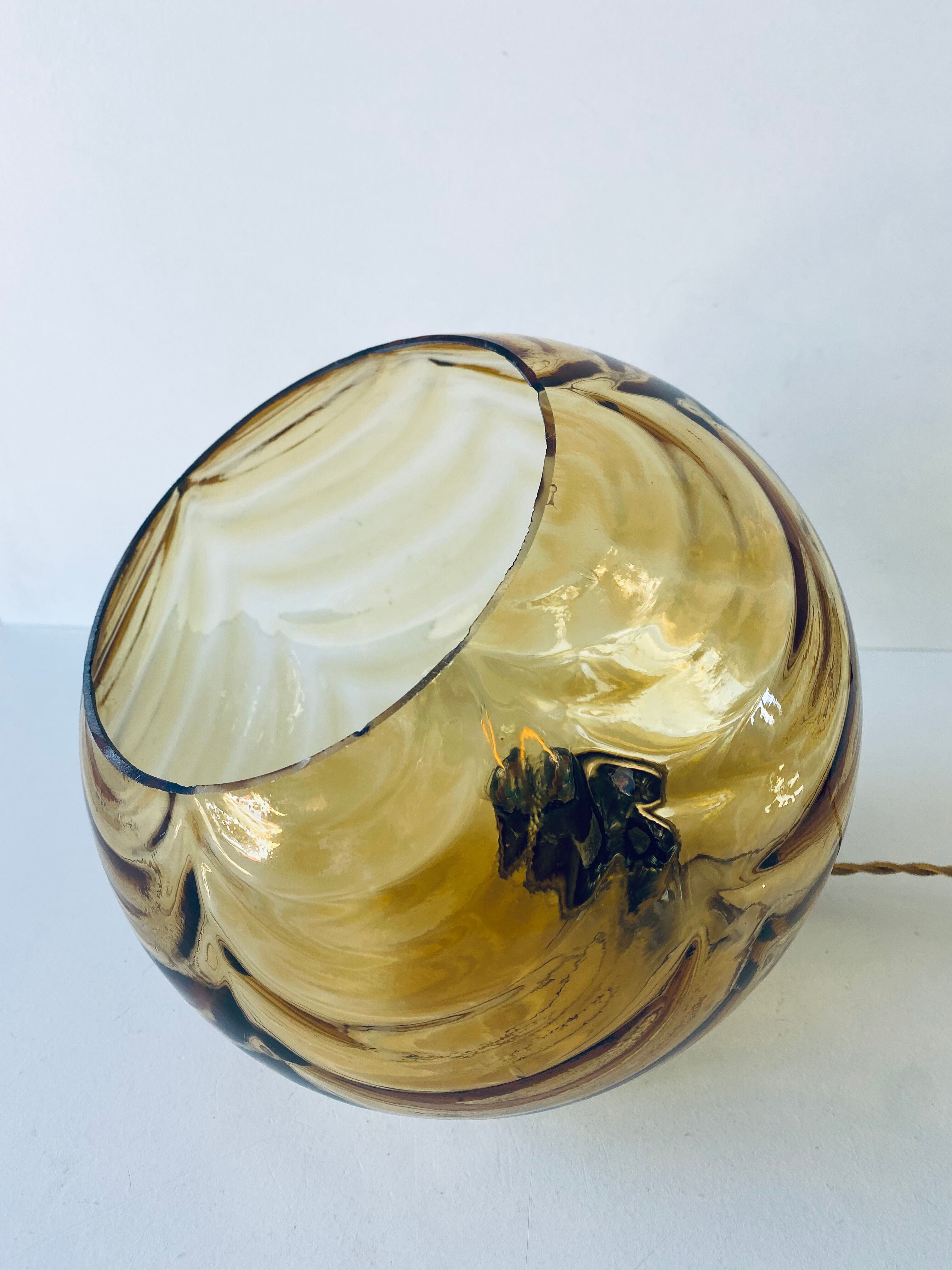 Amber glass ball suspension