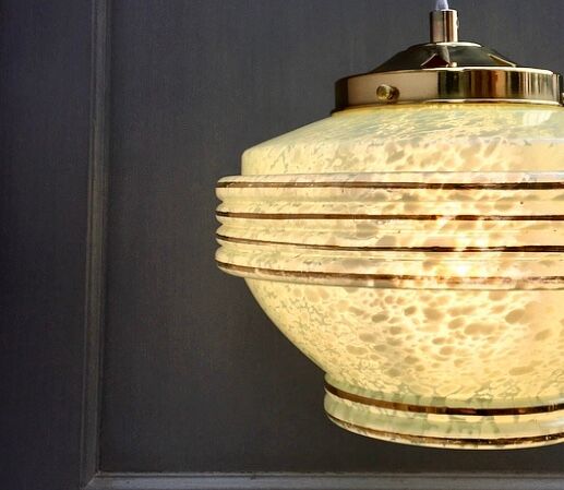 Vintage Globe art deco hanging in pale green Clichy glass.