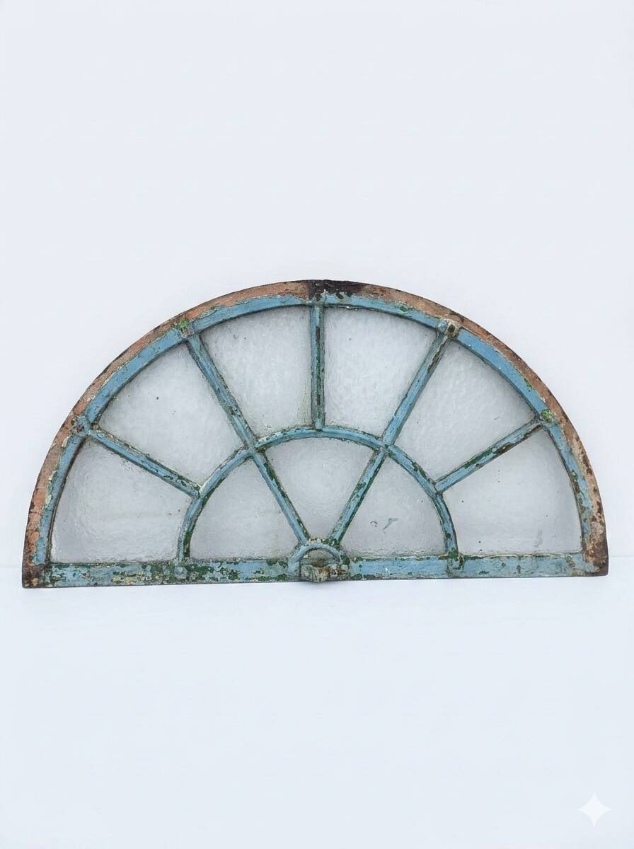 Old wrought iron full riveted gates from the 19th century.