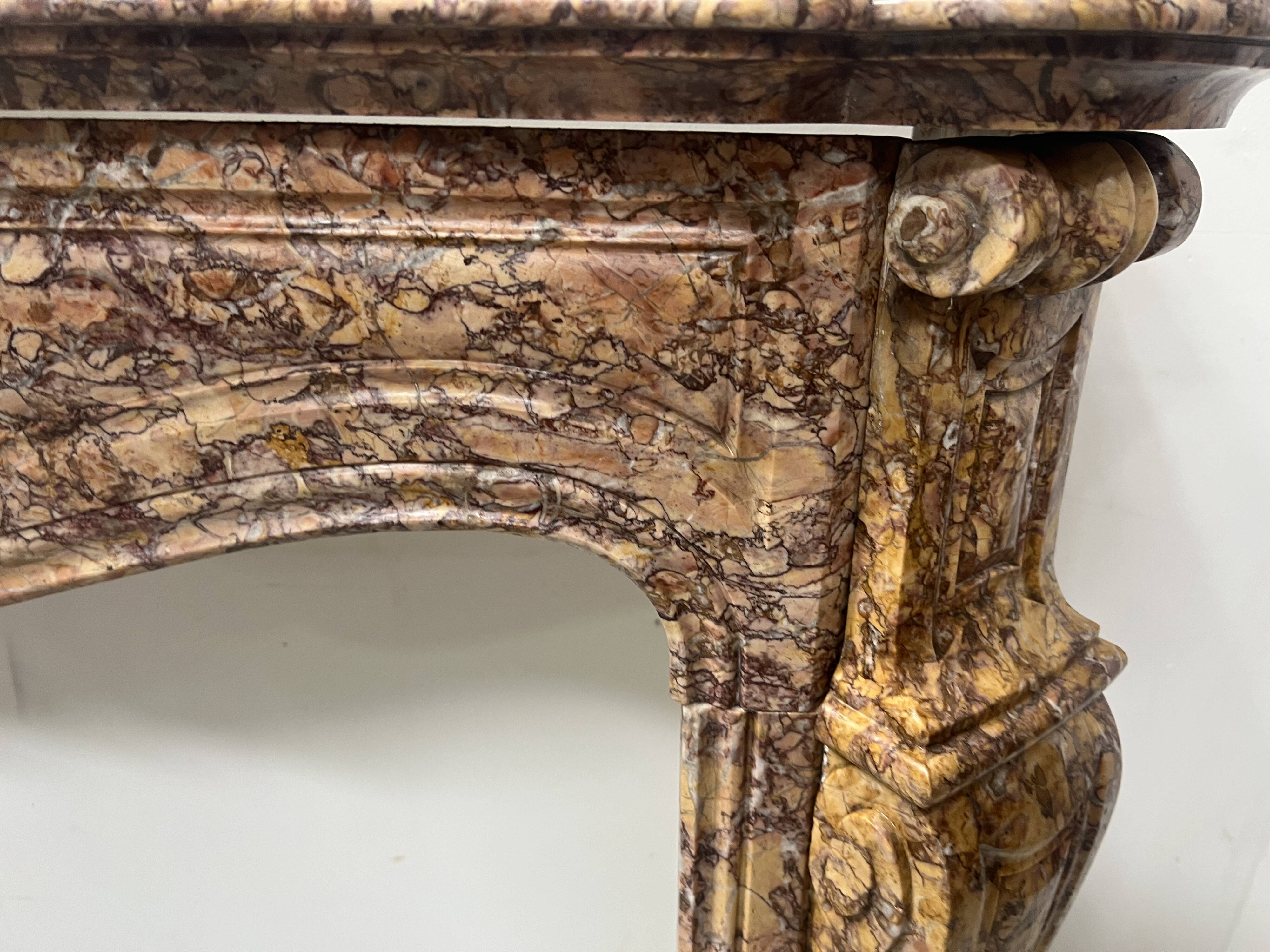Louis XV style fireplace, Pompadour model, speckled breccia marble, 19th century