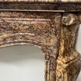Louis XV style fireplace, Pompadour model, speckled breccia marble, 19th century