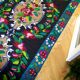 Romanian floral runner rug on blue background