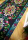 Romanian floral runner rug on blue background