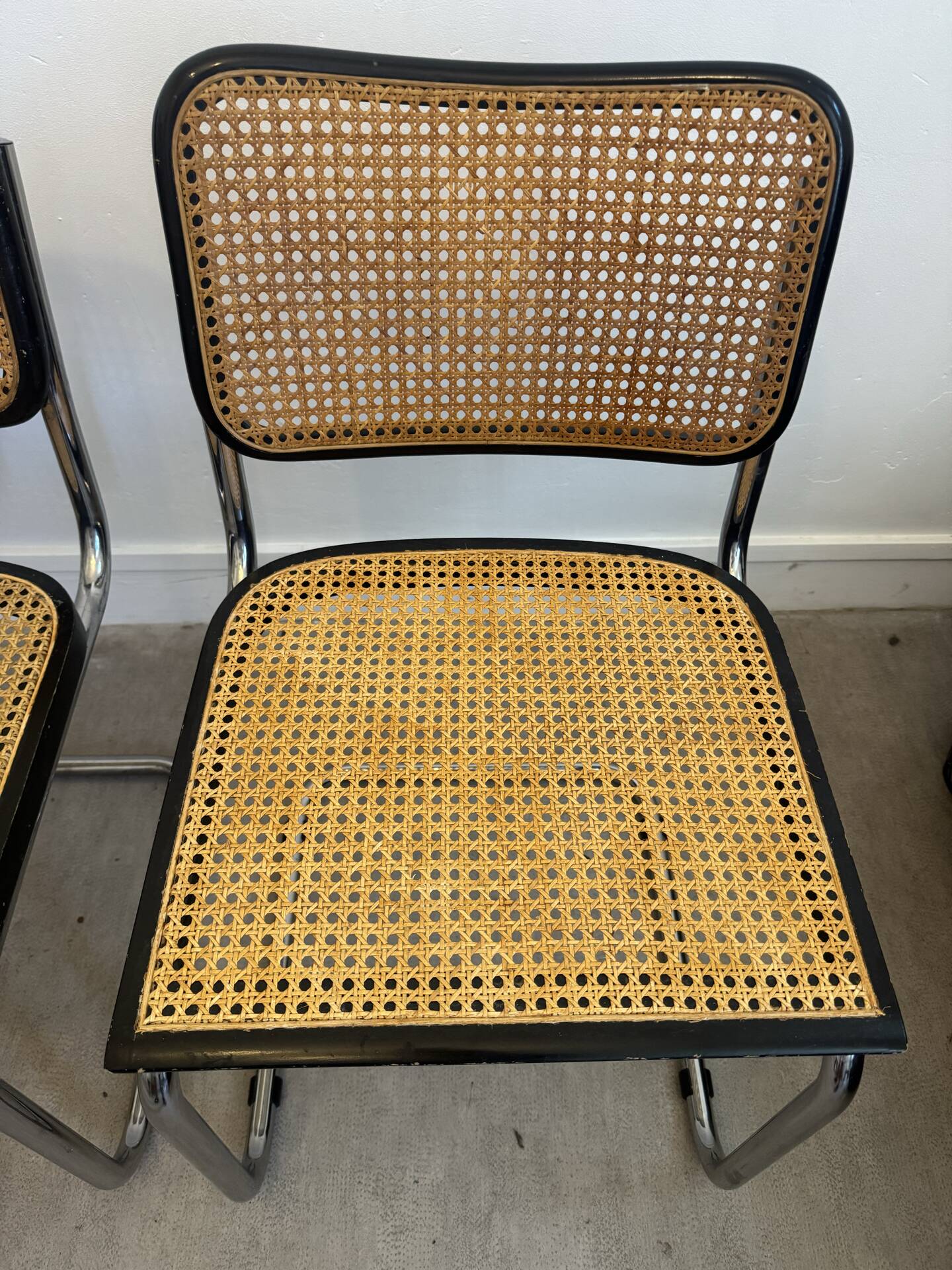 Pair of black Cesca chairs by Marcel Breuer