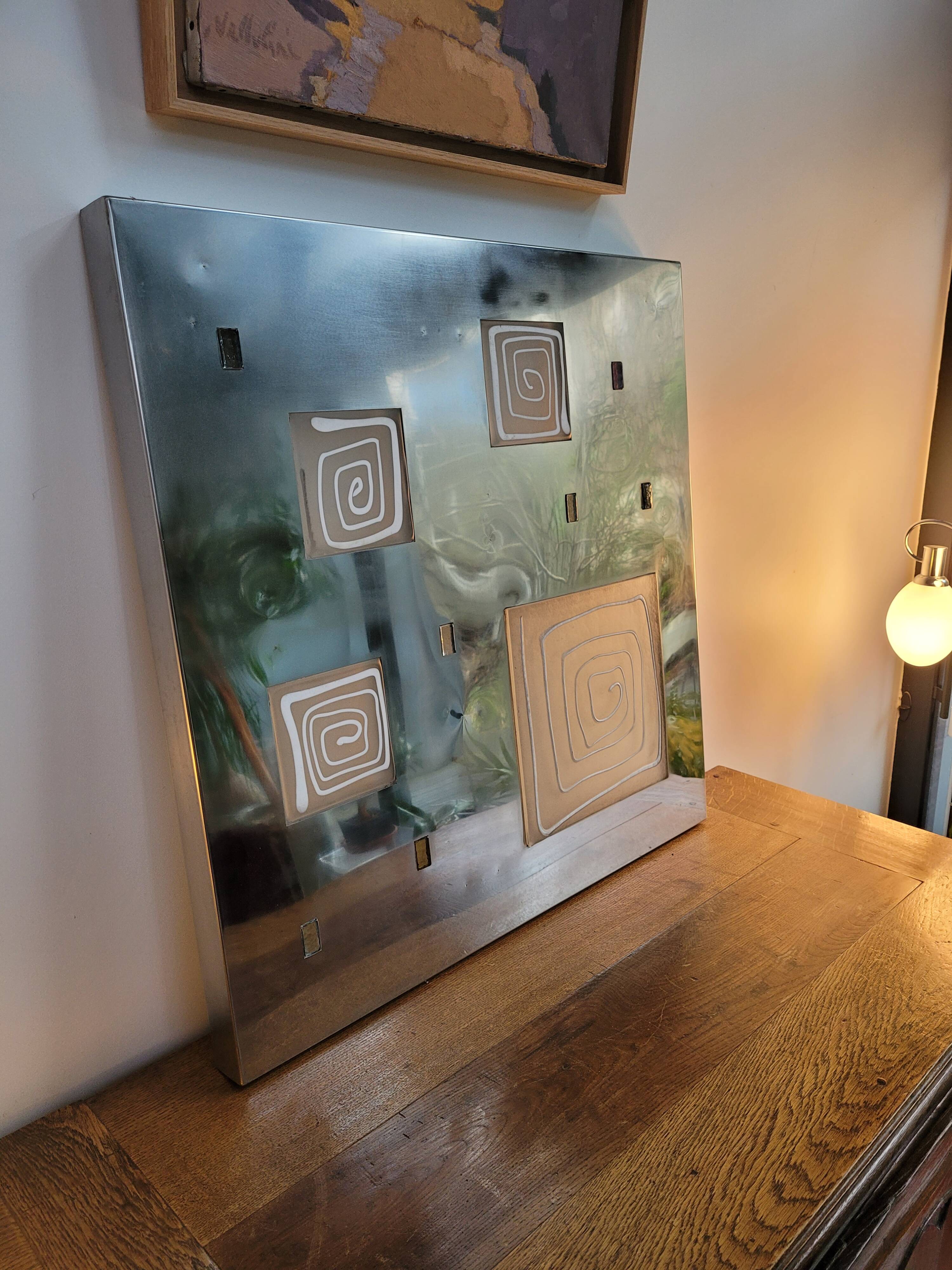Wall light by Angelo Brotto, polished steel and Murano glass.