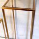 Pull-out harnesses in gilded brass and smoked glass.