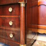 Commodity with mahogany detached columns and Empire gilded bronze ornaments