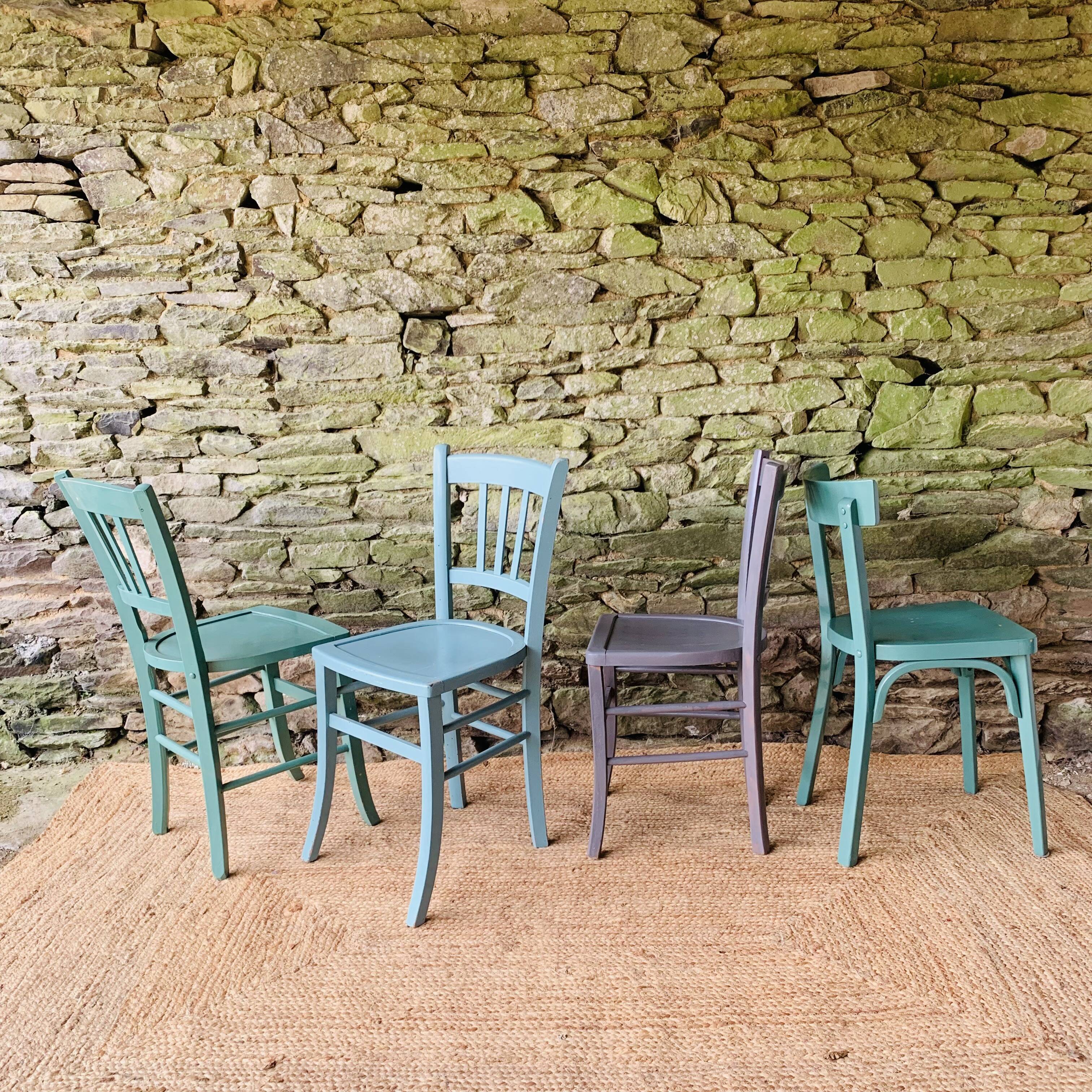 Set of four mismatched bistro chairs