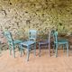 Set of four mismatched bistro chairs