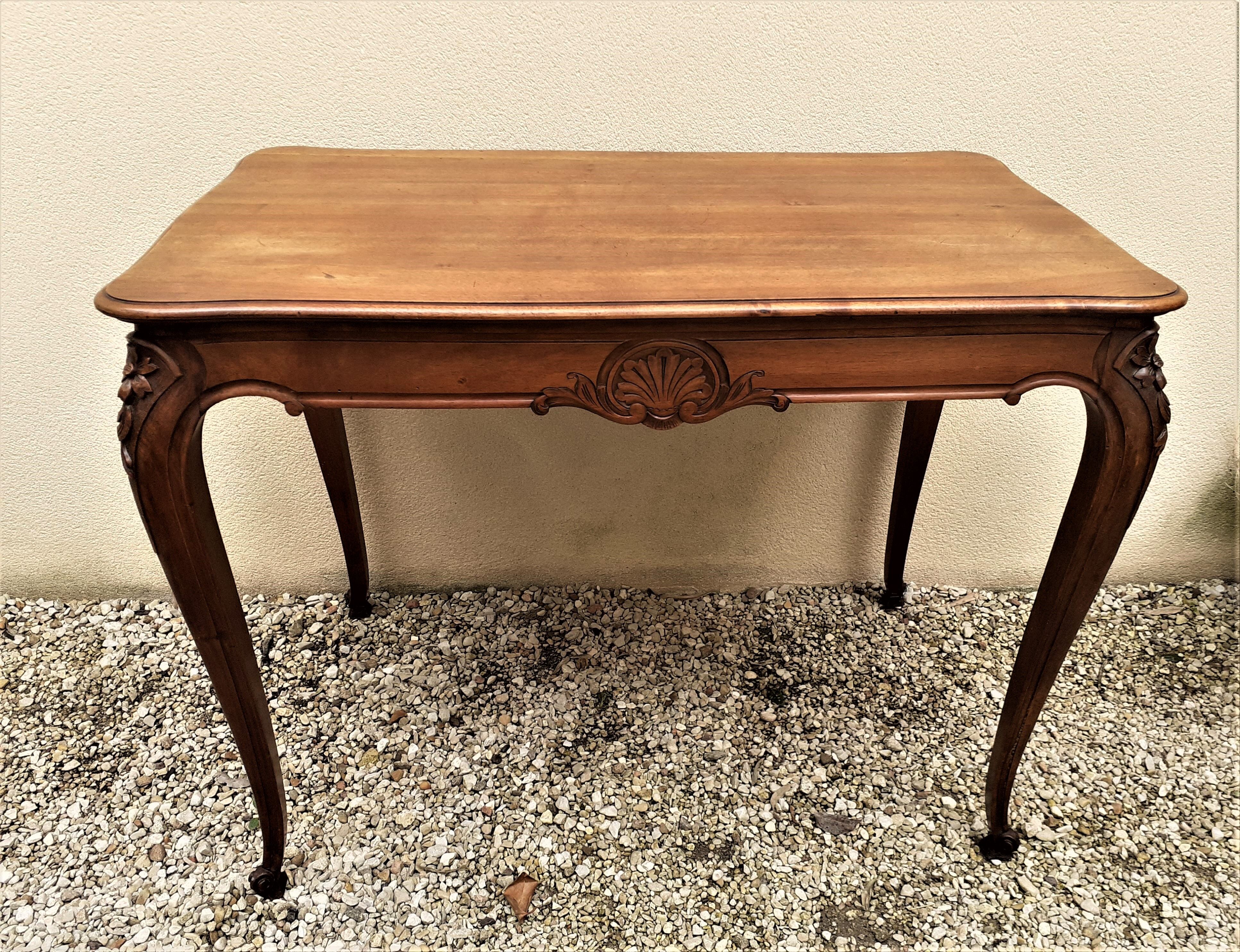 Flat desk, one-drawer table, nineteenth century carved walnut top in Louis XV style