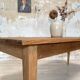 Vintage farm table with spindle legs.