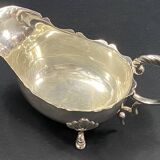 English George III style silver plated tripod sauce boat