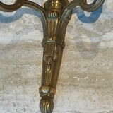 Set of 4 bronze wall lights in Louis XVI style.