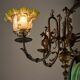 Antique adjustable height chandelier with original glasswork and brass detailing