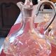 Service 1 carafe, 6 glasses and 1 tray in crystal.