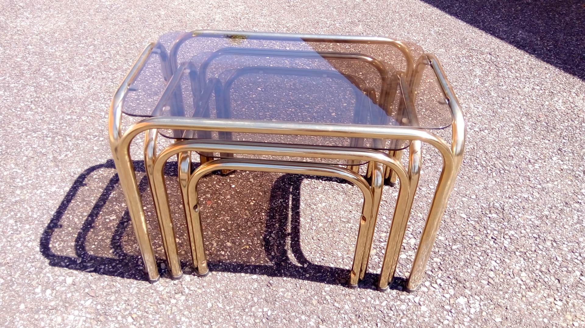 Series 3 pull out tables gold metal and glass