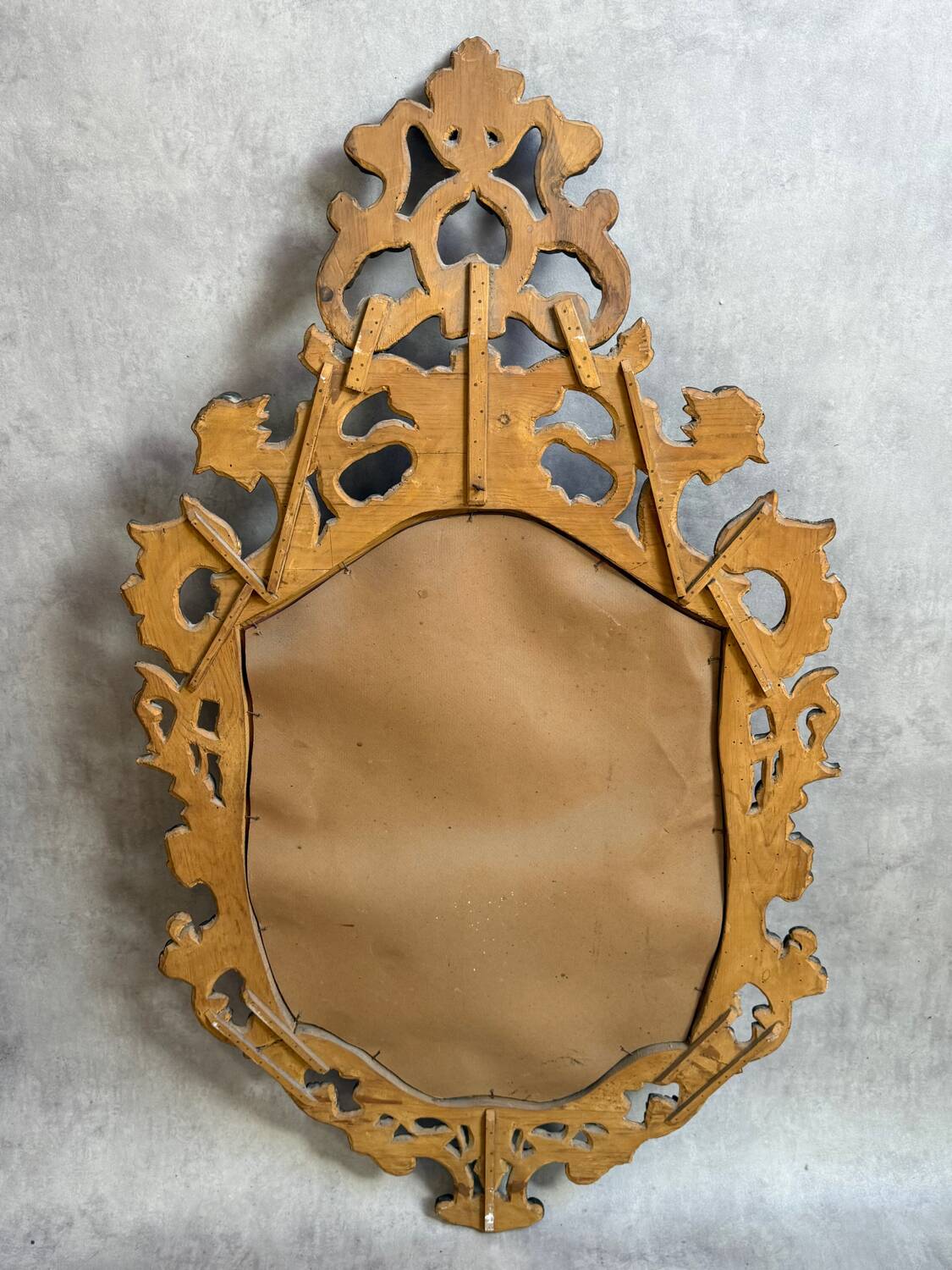 Golden wooden mirror in Baroque style from the 1950s, France.
