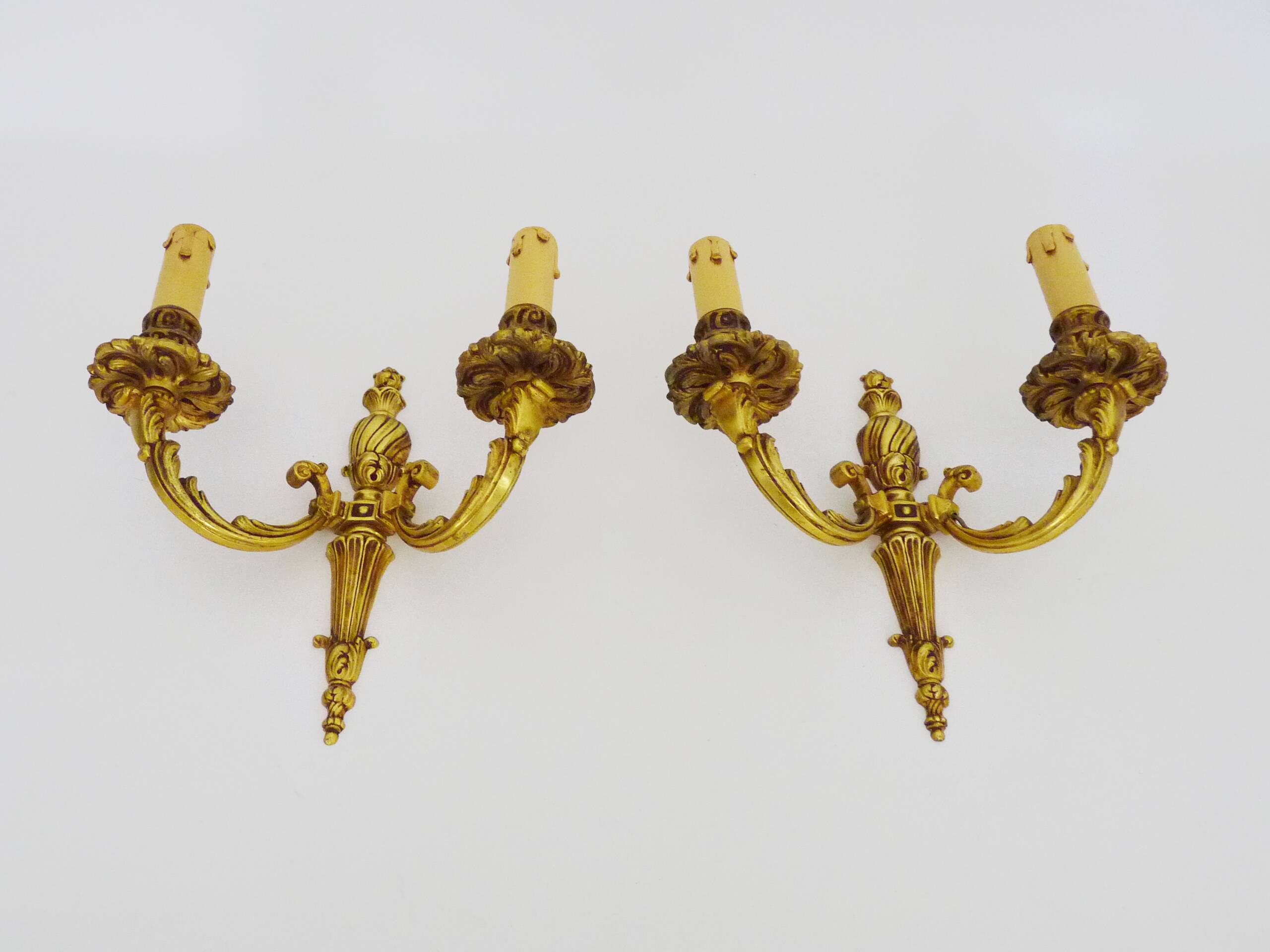 Old pair of bronze double-light wall sconces. 60s