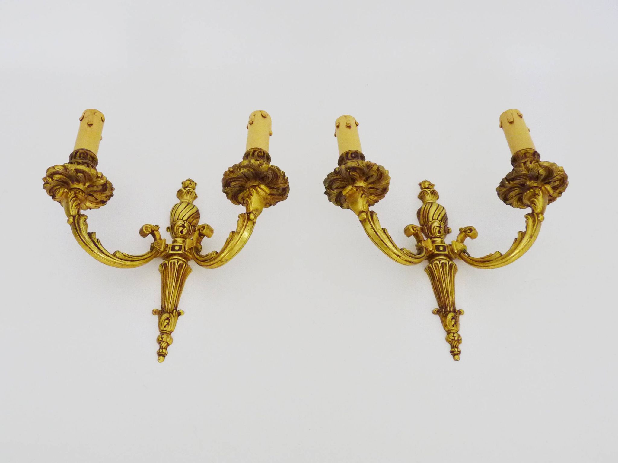 Old pair of bronze double-light wall sconces. 60s