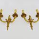 Old pair of bronze double-light wall sconces. 60s
