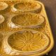 Vintage ochre earthenware artichoke dish, 6 compartments, relief flowers.