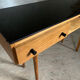Vintage desk with compass legs in oak