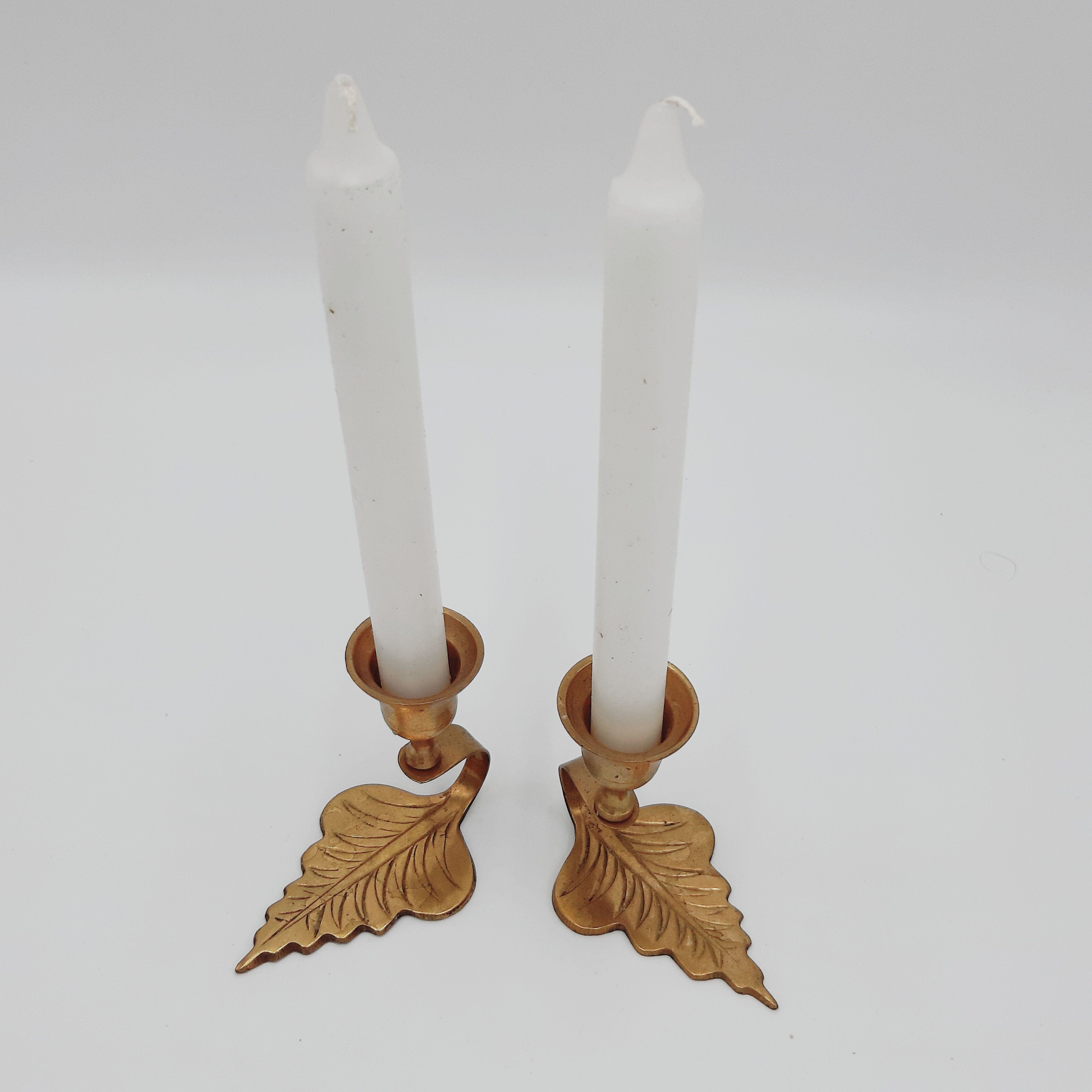 Pair of brass leaf candlesticks