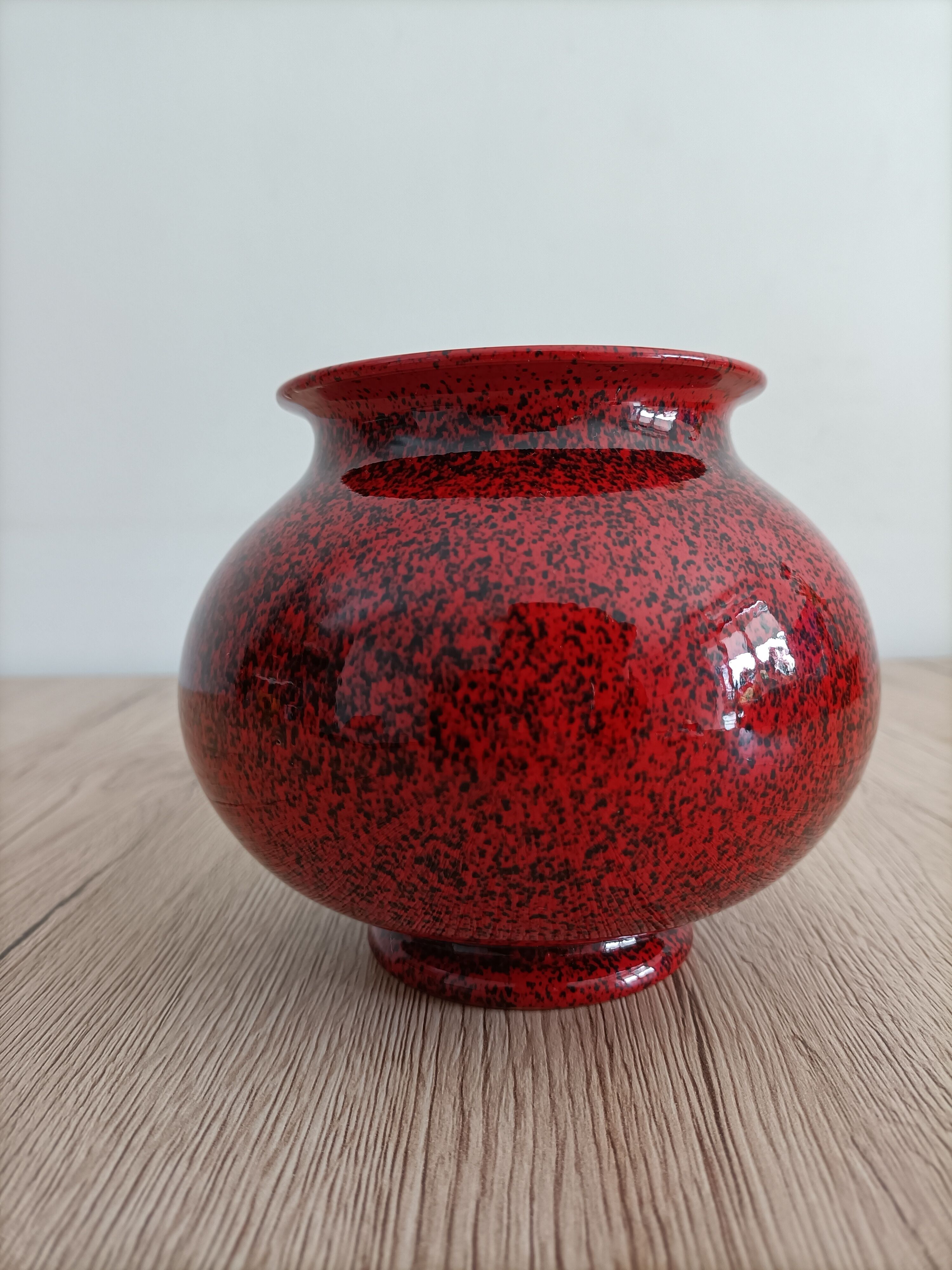 Red and black ceramic vase or pot cover