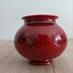 Red and black ceramic vase or pot cover
