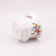 White porcelain pot (cache-pot) with floral patterns from Wunsiedel.
