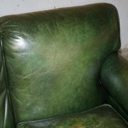 Victorian leather canapé, shield armrests, stamped Maple & Co.